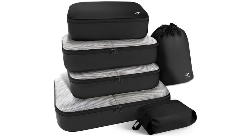 View of black HOTOR Packing Cubes for Suitcases set of six items on white background