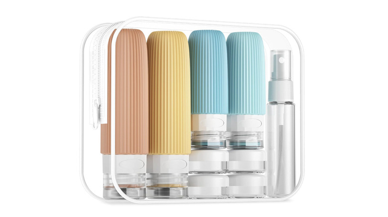 View of Mrsdry Travel Bottles Set in pale orange, yellow, and bright blue in a clear zip case on white background