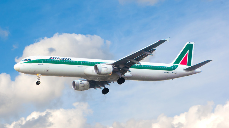 Alitalia airlines plane flying into London Heathrow