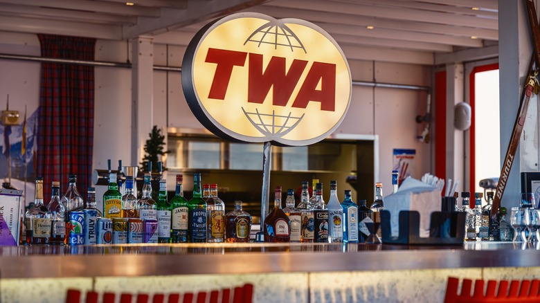 Hotel bar with vintage TWA signage