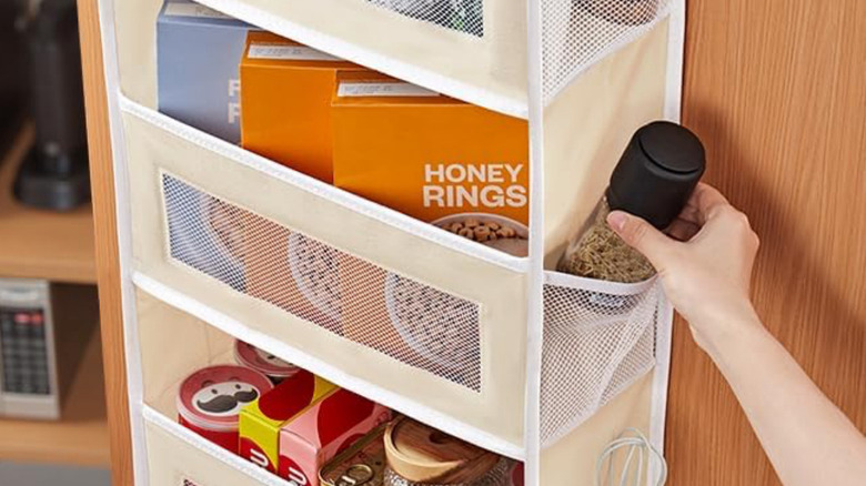 Products stored in the Jarlink Over-the-Door Organizer.