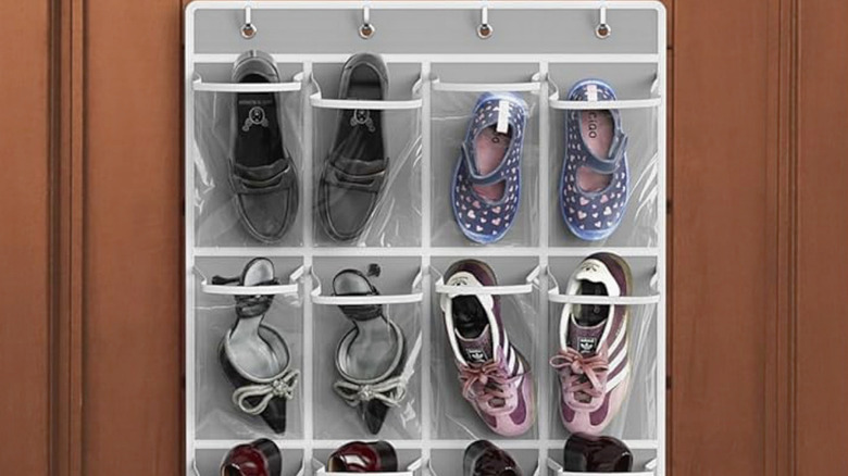 shoes stored on the back of a door in the Simple Houseware Over-the-Door Shoe Organizer