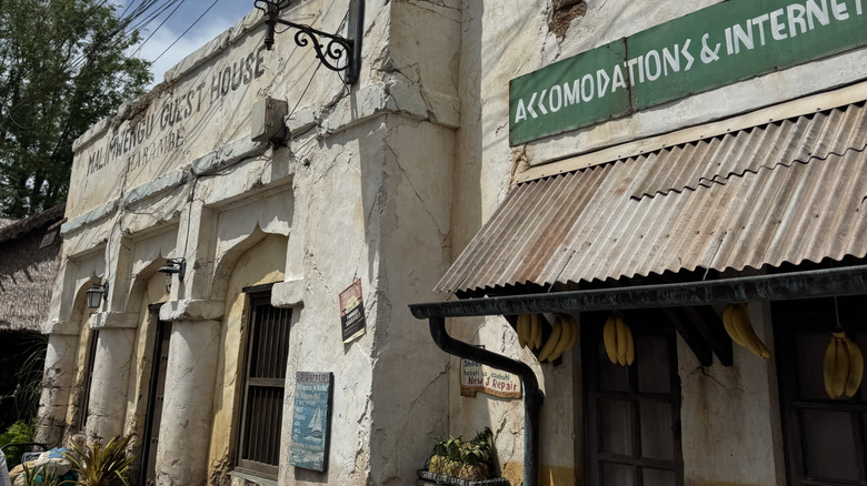 Exterior view of the weather African market-inspired buildings at Harambe Market restaurant, Disney's Animal Kingdom