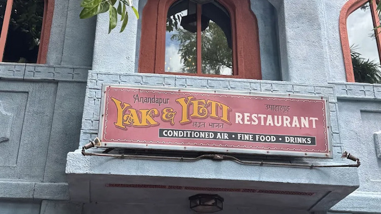 Exterior signage of Yak & Yeti Restaurant at Disney's Animal Kingdom theme park