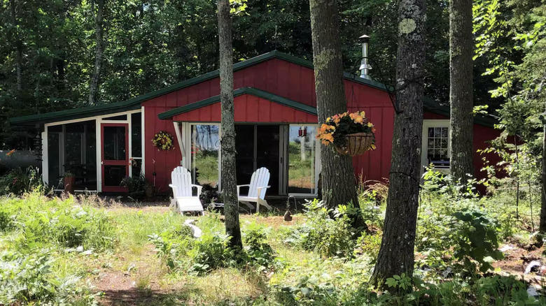 Red cabin exterior in the woods