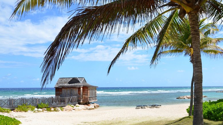 Overwater bungalow spa treatment cabin at Half Moon