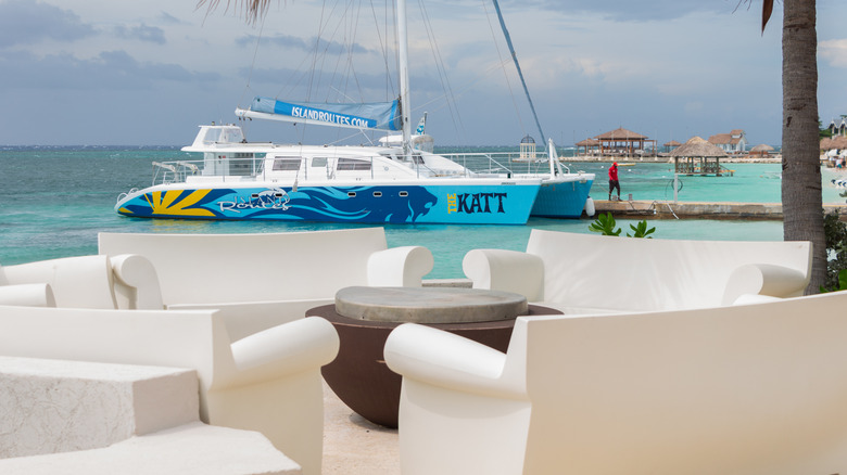View of a Katt sailboat from a sleek, white lounge area