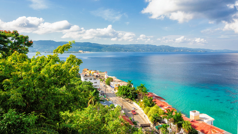 Aerial view of the coastline of Montego Bay, Jamaica with blue water and sunny skies