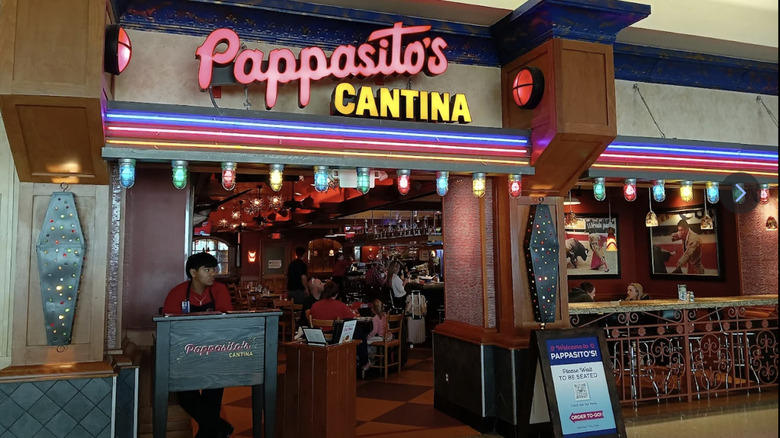 Exterior of restaurant with bright red and yellow sign