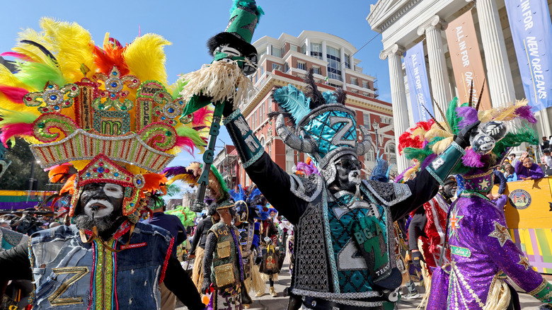 Marchers in Mardi Gras parade in New Orleans, Louisiana