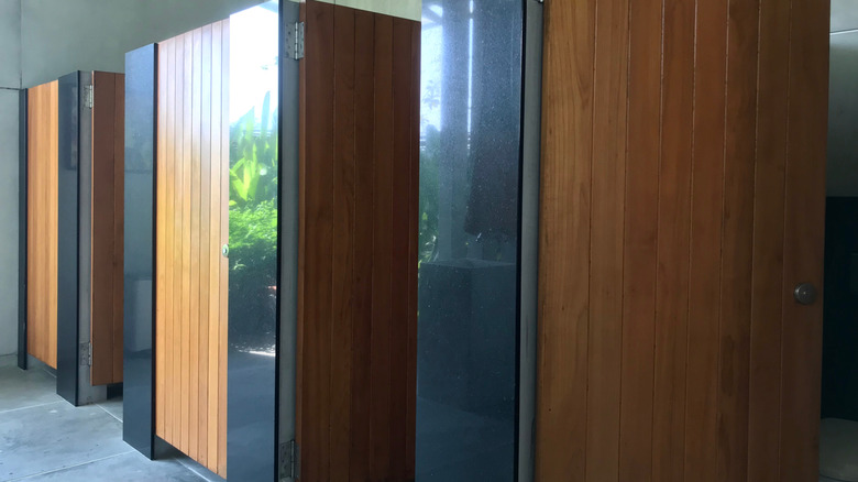 Public toilet doors with gaps