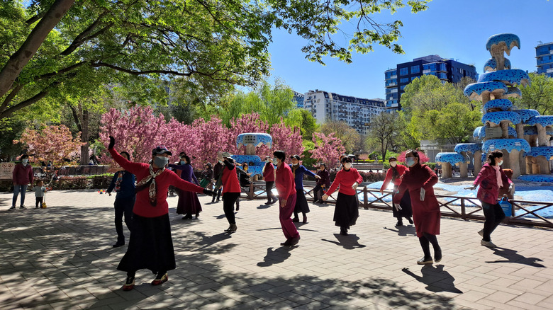 Retirees dancing in a public park in Beijing.