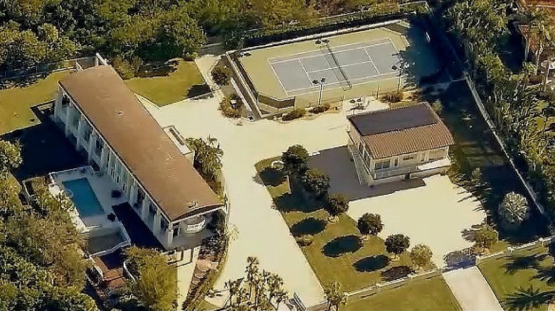 Aerial view of Stephen King's Casey Key, Florida property, including main house and tennis court