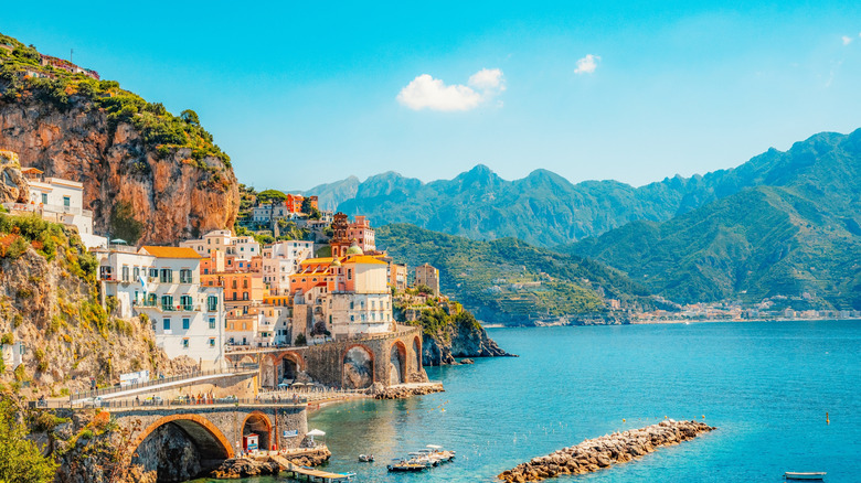 Amalfi coastline, Mediterranean blue sea on one side bordered by lush green hills