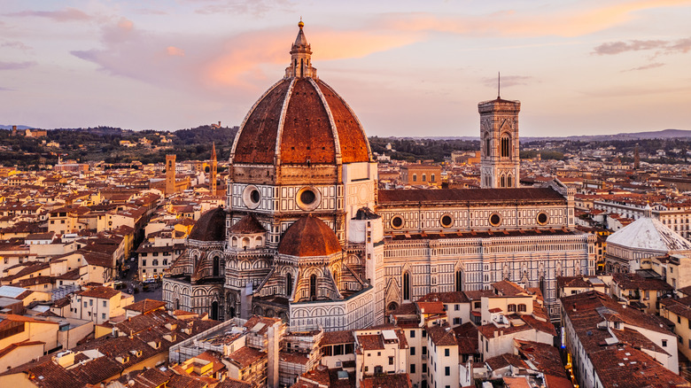 Aerial view of Duomo at sunset with lavender skies