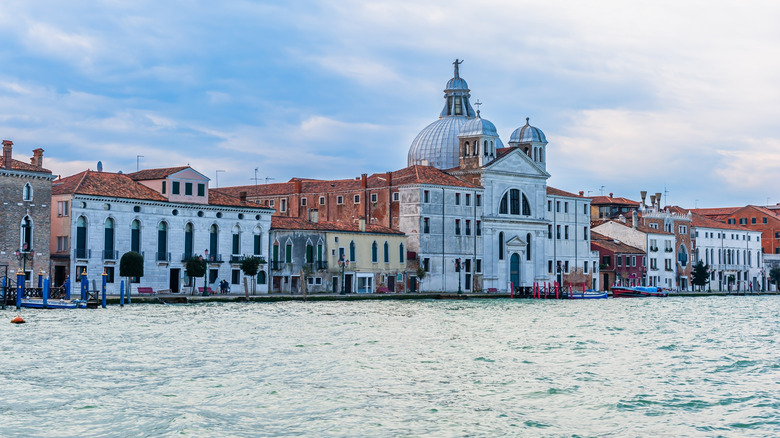 Renaissance church buildings standing tall along a Venice island coastline