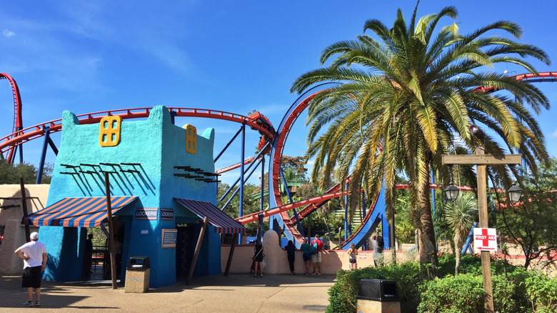 View of pathways and brightly painted buildings at Busch Gardens Tampa Bay on a sunny day