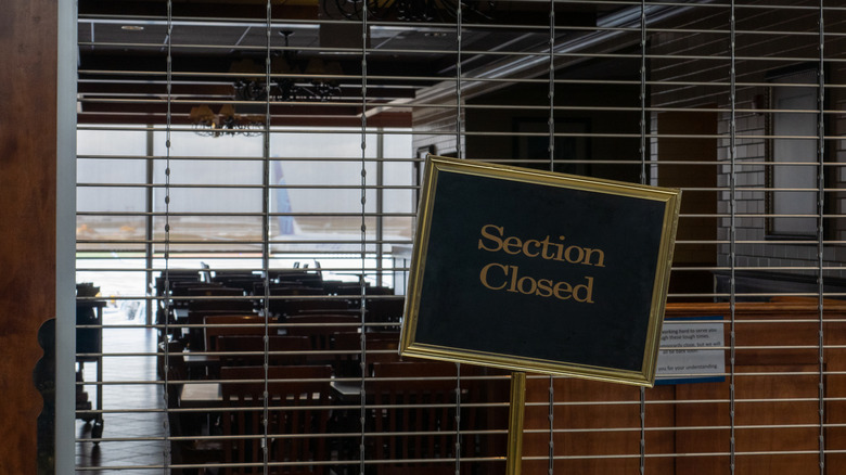 "Section Closed" sign at a restaurant at O'Hare International Airport in Chicago