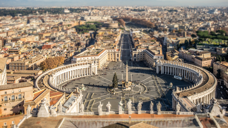 Aerial view overlooking St Peter's Square and Vatican City in afternoon winter sunlight