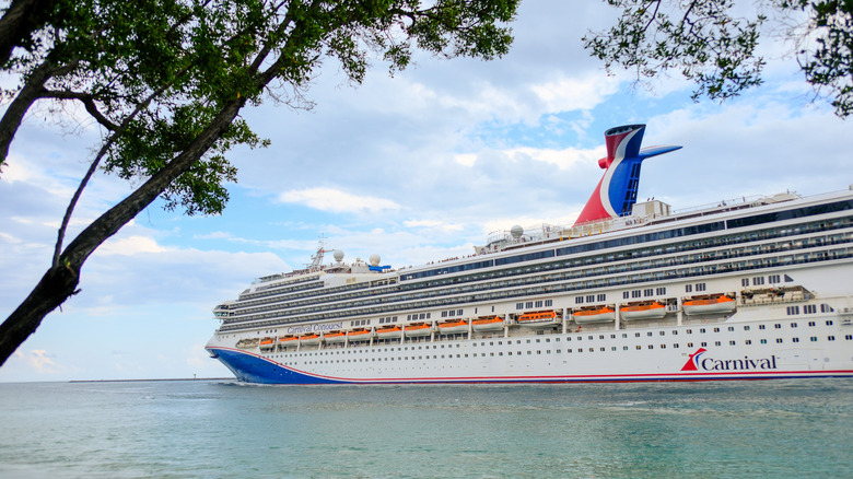 Mar 13 2026 - Miami, FL, USA - The Carnival Conquest cruise ship sailing out of the port of Miami, FL.