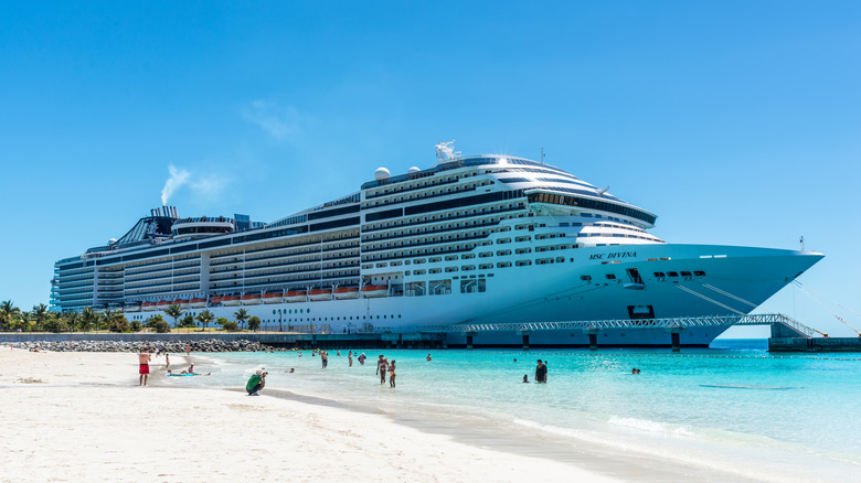 April 6, 2024: Cruise Ship MSC Divina is docked on the tropical island of Ocean Cay MSC Marine Reserve, The Bahamas.