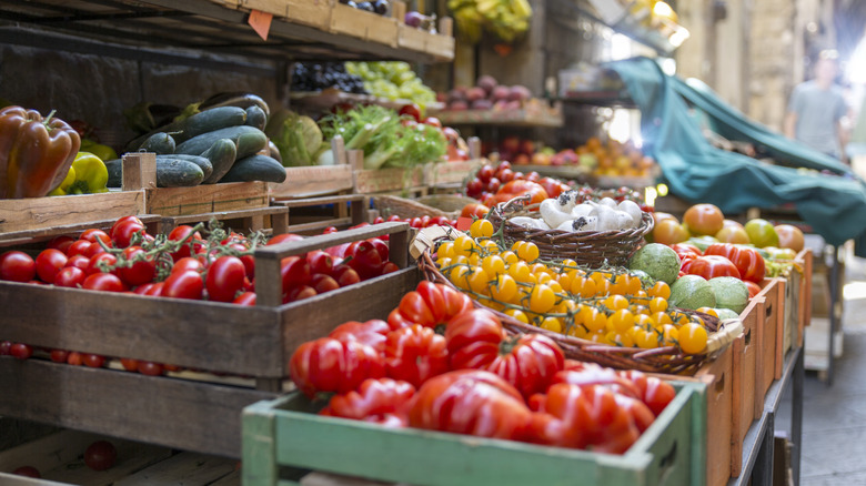 Produce at a fresh food market stall in Italy
