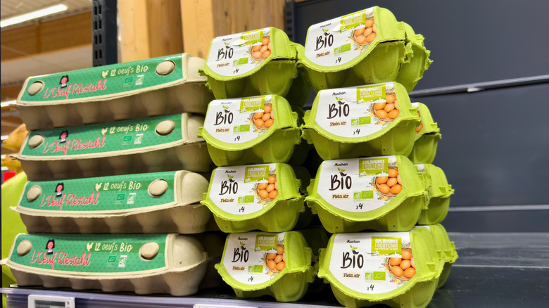 Unrefrigerated eggs on a grocery store shelf in France