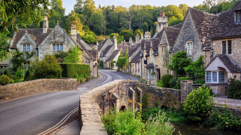 Traditional stone houses in Castle Combe village in Cotswolds, England