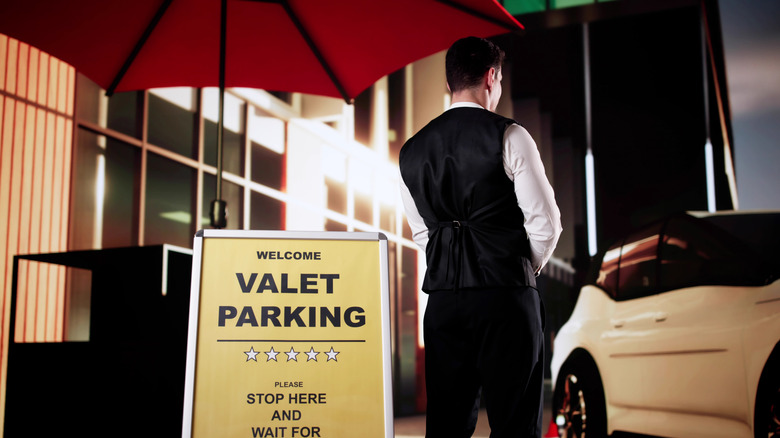 rear view of a valet parking attendant.