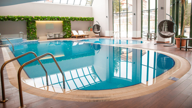 ot under the arch of second floor of indoor swimming pool.