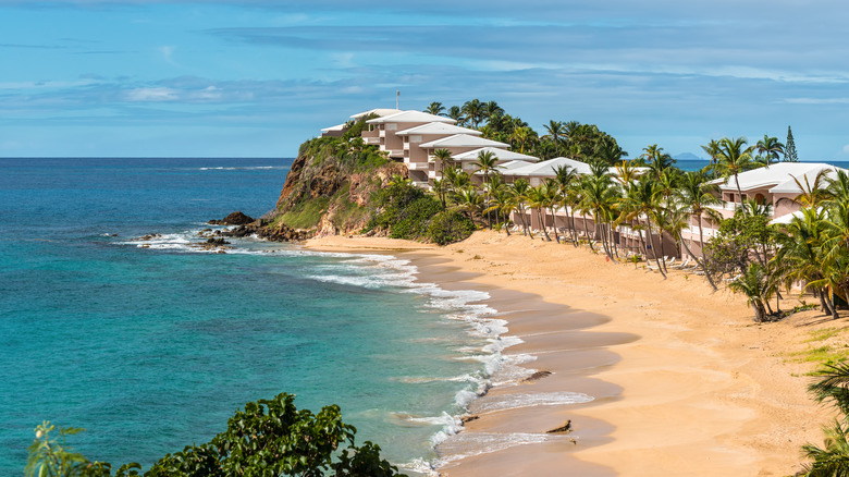 View of coral colored buildings overlooking the beach