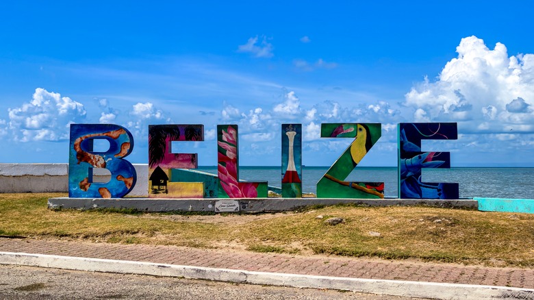 Painted "Belize" photo backdrop welcome sign