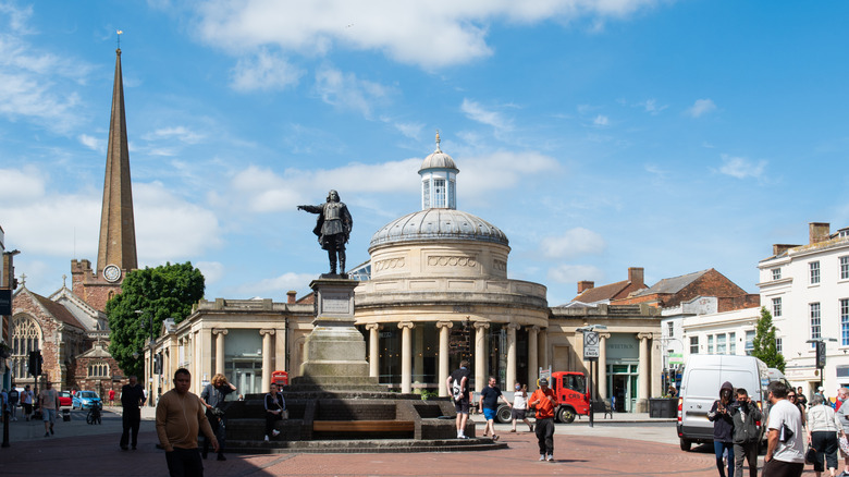 Statue of Robert Blake, The Corn Exchange Building and St Mary's Church in the city centre in Bridgwater, Somerset, U.K.