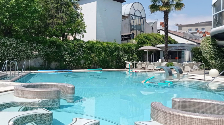 an outdoor pool at Hotel Terme Formentin in Abano Terme.