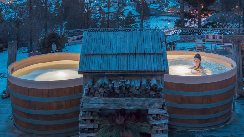 A girl in the luxury spa of QC Terme Bagni Nuovi at night.