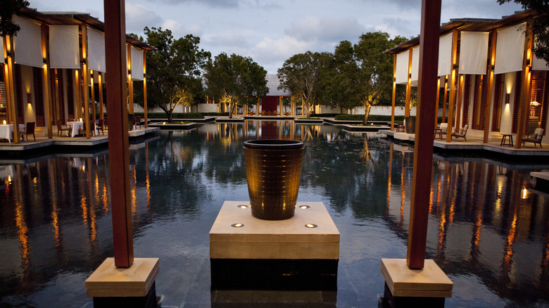 Amanyara resort reflecting pool surrounded by restaurants