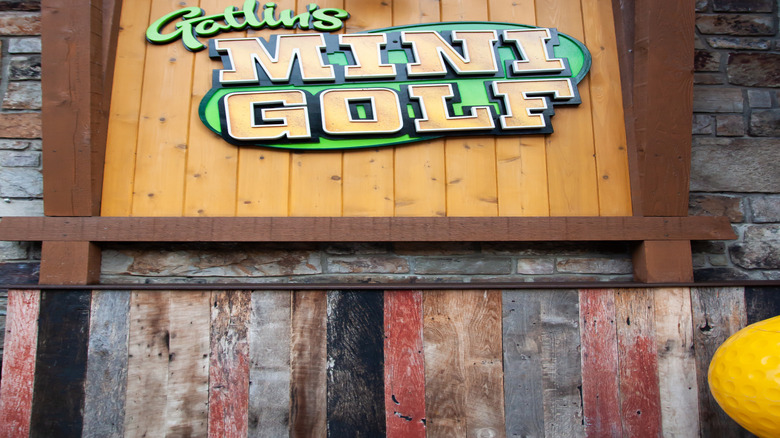 The sign for Gatlin's mini golf