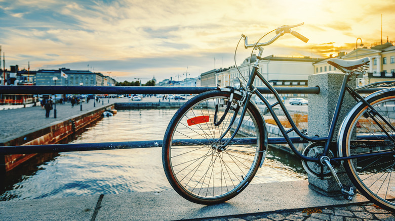 Black retro bicycle parked on the waterfront of Helsinki.