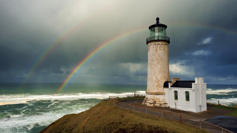 Washington State's North Head Lighthouse under a double rainbow