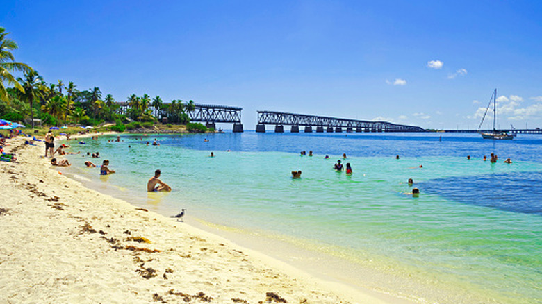 People relaxing on the beach in Bahia Honda State Park.