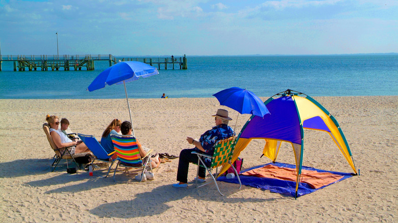 relaxing on the beach at Fort De Soto Park.
