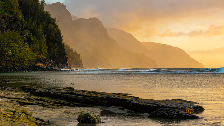 Sunset on the Nā Pali Cliffs, Ke'e Beach, Kauai, Hawaii.
