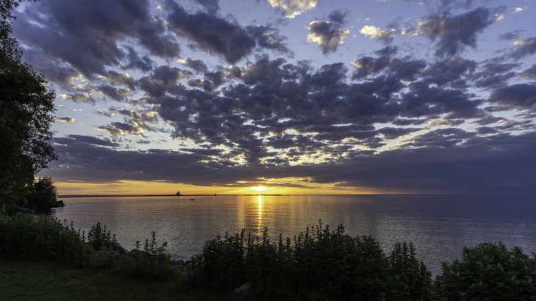 The sun sets over Lake Ontario, NY.