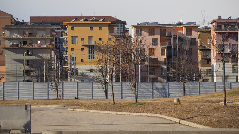 Villaggio Olimpico (meaning Olympic Village) housing complex in disrepair.
