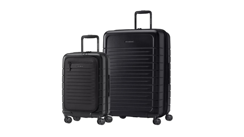 View of black Costco exclusive Samsonite Variate Expandable Set on white background