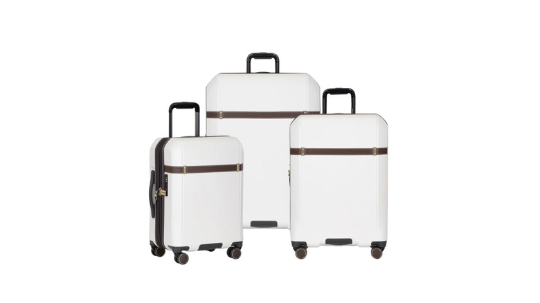 View of white Traveler's Choice Candlewood II Three-Piece Set with brown leather accents on white background