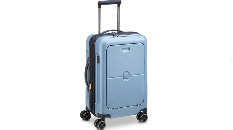 View of ice blue Delsey Turene 2.0 20-Inch Hardside Carry-On with Front Pocket on white background