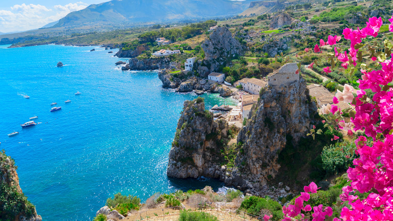 Pulled out view of the beautiful Scopello cliffs, Sicily Italy