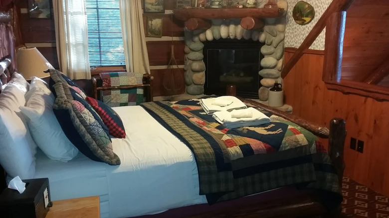 The bedroom of a rustic lodge room at Grand Pines Resort, Hayward, Wisconsin