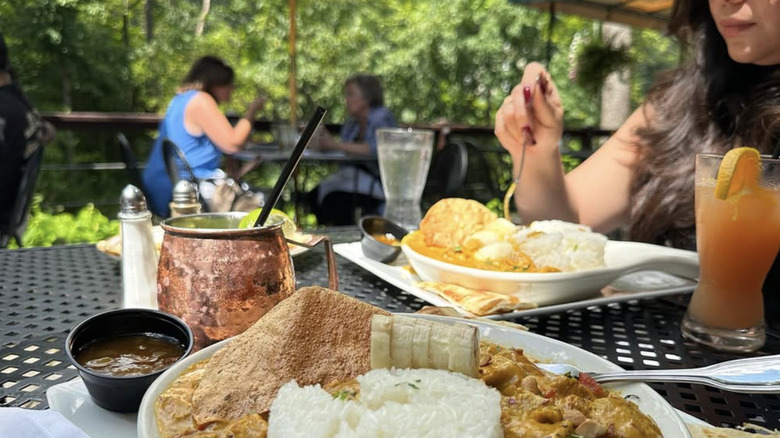 A riverside view from the terrace at White Horse Country Pub & Restaurant in New Preston, CT.